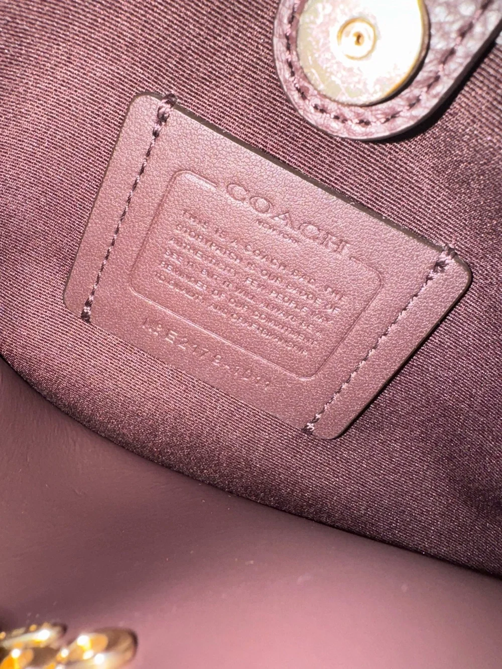 Coach Red Pebbled Leather Shoulder Tote with Gold Hardware Strap not included.